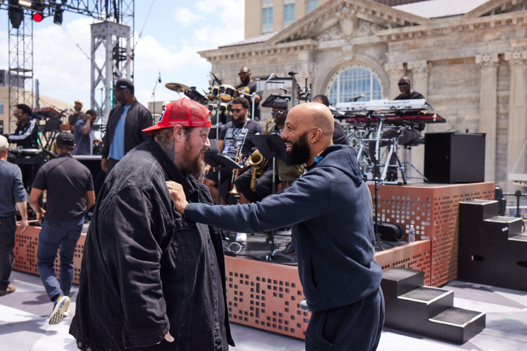 Jelly Roll and Common talk on-stage pre-show at Live From Detroit: The Concert at Michigan Central.
